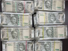Title: Rs 94 Crore Cash and Rs 8 Crore Jewelry Seized in I-T Raids Across 4 States