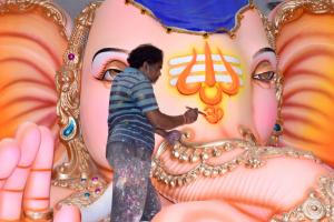 Final touches to Lord Ganesh idols